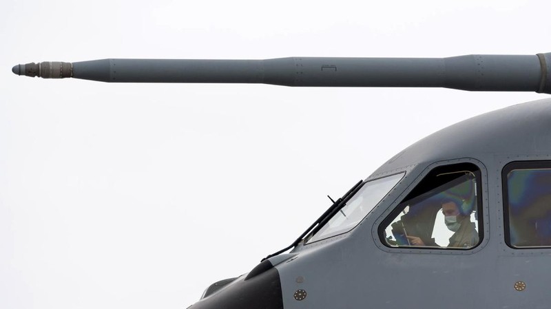 An Indonesian Air Force soldier guards in front of British air force RAF A400M transport aircraft during a visit at Halim Perdanakusuma airport in Jakarta, Indonesia, Tuesday, Nov. 12, 2019.(AP Photo/Achmad Ibrahim)