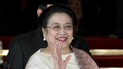 Megawati Sukarnoputri Former Indonesian President Megawati Sukarnoputri waves as she arrives for the inauguration of Indonesia's seventh President Joko Widodo at Parliament in Jakarta, Indonesia, Monday, Oct. 20, 2014. (AP Photo/Mark Baker)