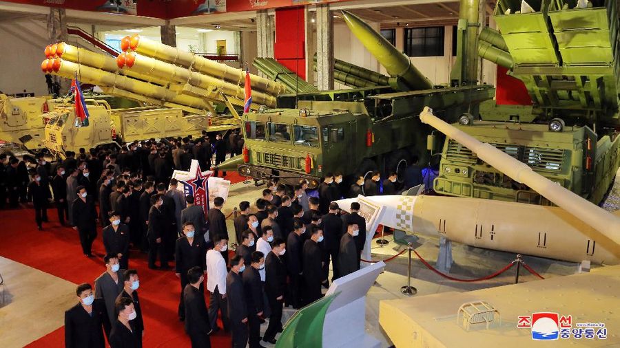 North Korea's leader Kim Jong Un looks at military weapons and vehicles on display at the Defence Development Exhibition, in Pyongyang, North Korea, in this undated photo released on October 12, 2021 by North Korea's Korean Central News Agency (KCNA).      KCNA via REUTERS    ATTENTION EDITORS - THIS IMAGE WAS PROVIDED BY A THIRD PARTY. REUTERS IS UNABLE TO INDEPENDENTLY VERIFY THIS IMAGE. NO THIRD PARTY SALES. SOUTH KOREA OUT. NO COMMERCIAL OR EDITORIAL SALES IN SOUTH KOREA.