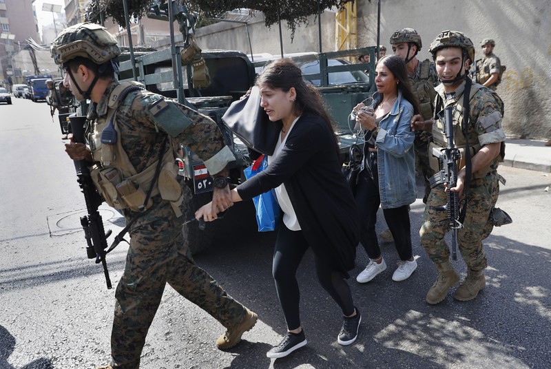 Lebanon A supporter of the Shiite Hezbollah and Amal groups burns posters that show the U.S. Ambassador to Lebanon Dorothy Shea, and Arabic that reads: