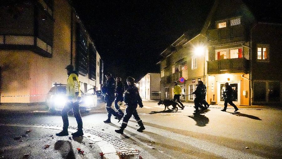Police stand at the scene after an attack in Kongsberg, Norway, Wednesday, Oct. 13, 2021. Several people have been killed and others injured by a man armed with a bow and arrow in a town west of the Norwegian capital, Oslo. (Hakon Mosvold Larsen/NTB Scanpix via AP)