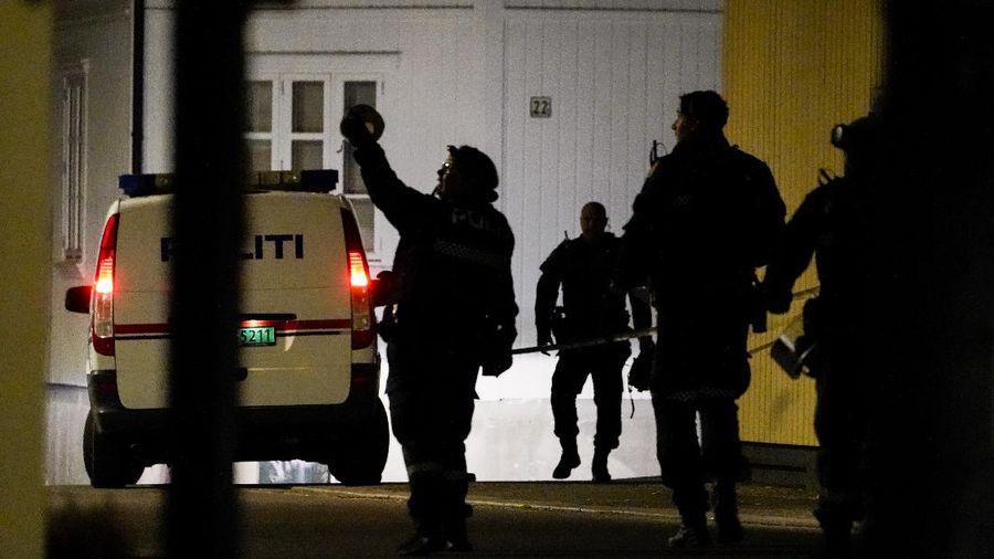 Police stand at the scene after an attack in Kongsberg, Norway, Wednesday, Oct. 13, 2021. Several people have been killed and others injured by a man armed with a bow and arrow in a town west of the Norwegian capital, Oslo. (Hakon Mosvold Larsen/NTB Scanpix via AP)