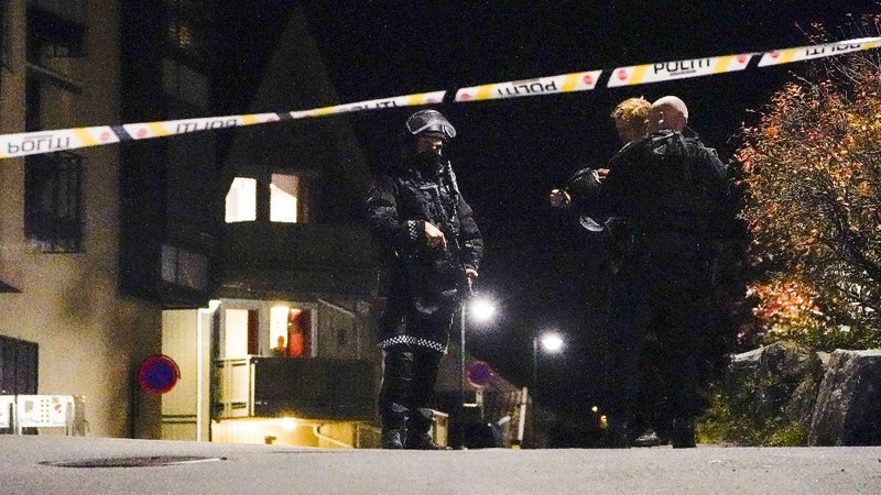 Police stand at the scene after an attack in Kongsberg, Norway, Wednesday, Oct. 13, 2021. Several people have been killed and others injured by a man armed with a bow and arrow in a town west of the Norwegian capital, Oslo. (Hakon Mosvold Larsen/NTB Scanpix via AP)