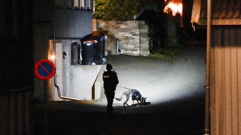 Police stand at the scene after an attack in Kongsberg, Norway, Wednesday, Oct. 13, 2021. Several people have been killed and others injured by a man armed with a bow and arrow in a town west of the Norwegian capital, Oslo. (Hakon Mosvold Larsen/NTB Scanpix via AP)