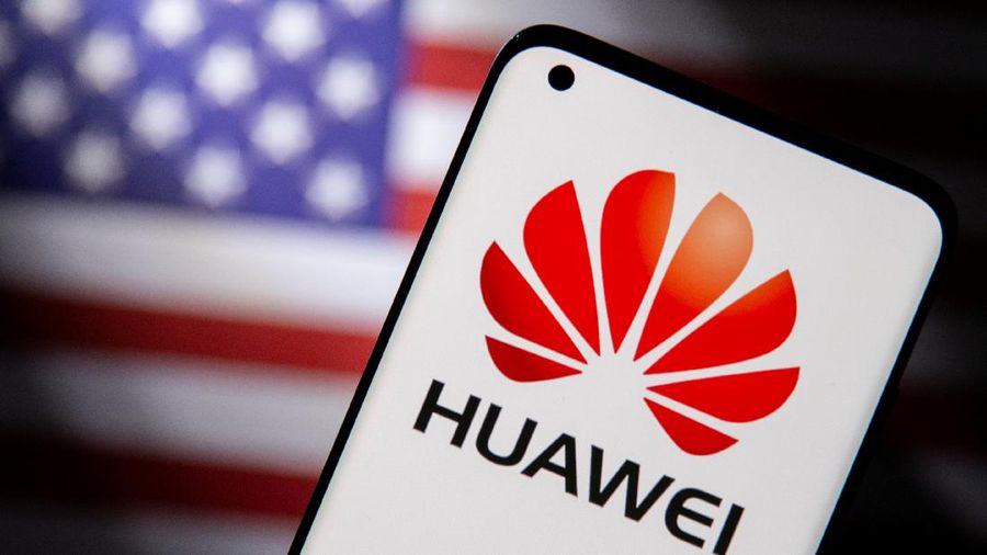 FILE PHOTO: Smartphone with a Huawei logo is seen in front of a U.S. flag in this illustration taken September 28, 2021. REUTERS/Dado Ruvic/Illustration/File Photo