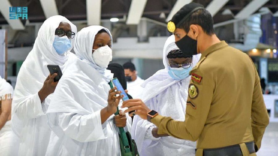 Pilgrims perform the Fajr prayer without social distancing, after Saudi authorities announced the easing of coronavirus disease (COVID-19) restrictions, at the Grand Mosque in holy city of Mecca, Saudi Arabia, October 17, 2021. Saudi Press Agency/Handout via REUTERS ATTENTION EDITORS - THIS PICTURE WAS PROVIDED BY A THIRD PARTY