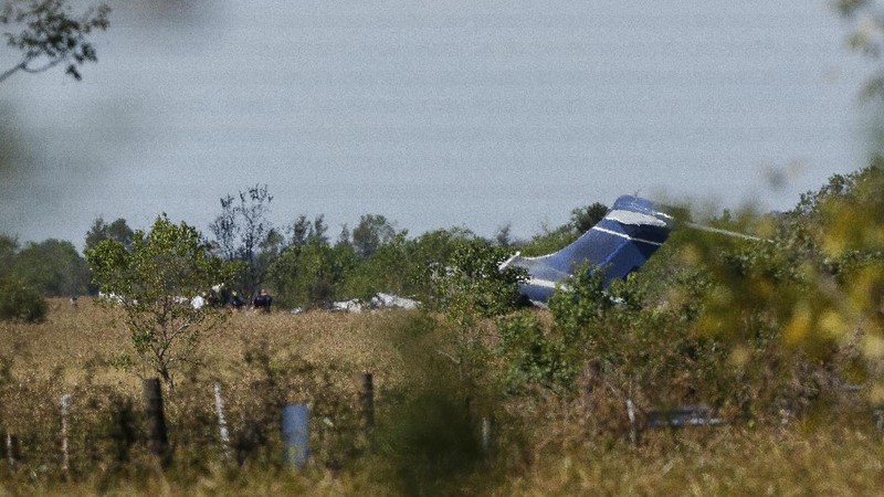 In this frame grab from video provided by KTRK, firefighters work the scene where a plane taking passengers from Texas to the AL Championship Series game in Boston burst into flames after it ran off a runway during takeoff Tuesday, Oct. 19, 2021, in Brookshire, Texas. No one was seriously hurt, authorities said. (KTRK via AP)