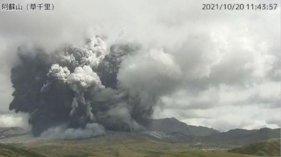 A video grab from the Japan Meteorological Agency's live camera image shows an eruption of Mount Aso in Aso, Kumamoto prefecture, southwestern Japan, October 20, 2021. Japan Meteorological Agency/Handout via REUTERS ATTENTION EDITORS - THIS IMAGE WAS PROVIDED BY A THIRD PARTY. MANDATORY CREDIT.