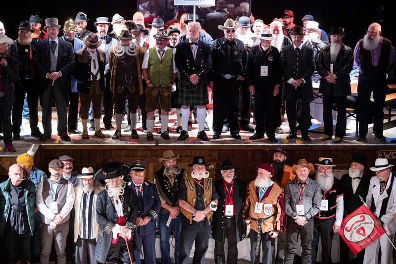 Peserta kejuaraan kumis dan jenggot Jerman 2021 Participant Norbert Dopf from Austria arrives for the German Moustache and Beard Championships 2021 at Pullman City Western Theme Park in Eging am See, Germany, October 23, 2021. REUTERS/Lukas Barth TPX IMAGES OF THE DAY