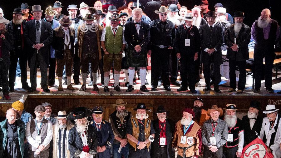 Participant Norbert Dopf from Austria arrives for the German Moustache and Beard Championships 2021 at Pullman City Western Theme Park in Eging am See, Germany, October 23, 2021. REUTERS/Lukas Barth     TPX IMAGES OF THE DAY