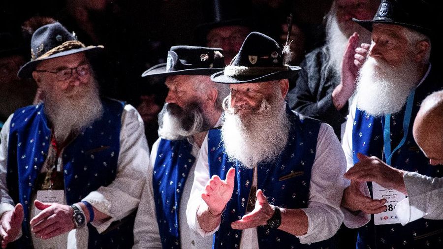Participant Norbert Dopf from Austria arrives for the German Moustache and Beard Championships 2021 at Pullman City Western Theme Park in Eging am See, Germany, October 23, 2021. REUTERS/Lukas Barth     TPX IMAGES OF THE DAY