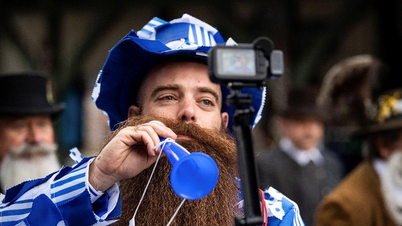 Participant Norbert Dopf from Austria arrives for the German Moustache and Beard Championships 2021 at Pullman City Western Theme Park in Eging am See, Germany, October 23, 2021. REUTERS/Lukas Barth     TPX IMAGES OF THE DAY