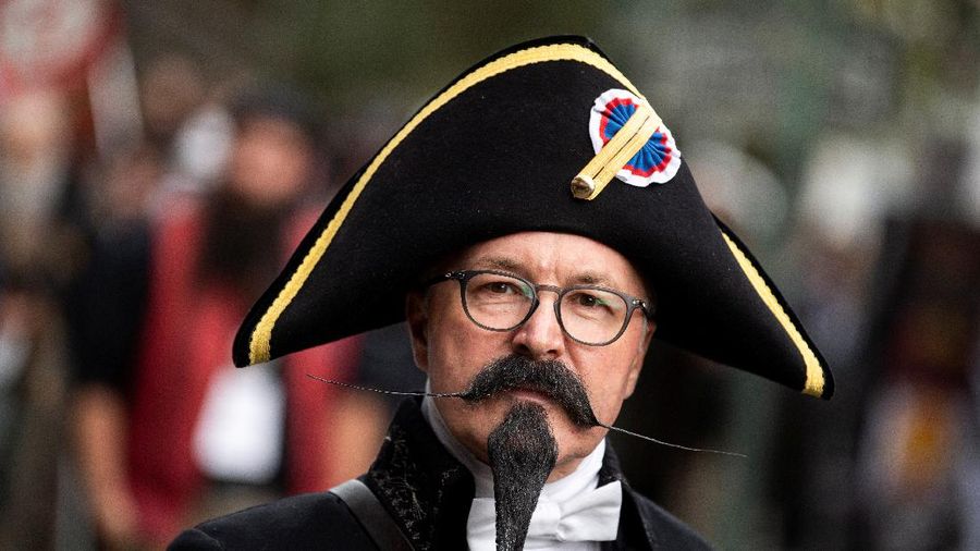 Participant Norbert Dopf from Austria arrives for the German Moustache and Beard Championships 2021 at Pullman City Western Theme Park in Eging am See, Germany, October 23, 2021. REUTERS/Lukas Barth     TPX IMAGES OF THE DAY