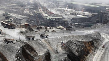 FILE PHOTO: Trucks are parked at the open-pit mine of PT Freeport's Grasberg copper and gold mine complex near Timika, in the eastern region of Papua, Indonesia on September 19, 2015 in this file photo taken by Antara Foto.   REUTERS/Muhammad Adimaja/Antara FotoATTENTION EDITORS - THIS IMAGE HAS BEEN SUPPLIED BY A THIRD PARTY. IT IS DISTRIBUTED, EXACTLY AS RECEIVED BY REUTERS, AS A SERVICE TO CLIENTS. FOR EDITORIAL USE ONLY. NOT FOR SALE FOR MARKETING OR ADVERTISING CAMPAIGNS MANDATORY CREDIT. INDONESIA OUT. NO COMMERCIAL OR EDITORIAL SALES IN INDONESIA./File Photo