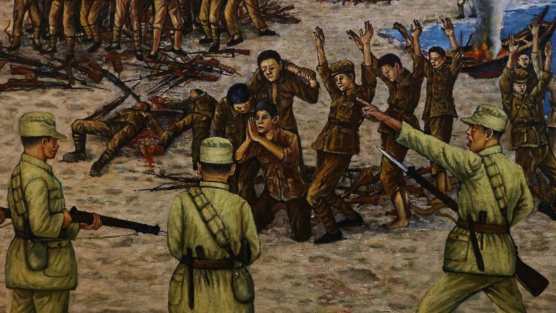 A mannequin of a soldier points a model gun from inside a bunker past Shihyu Islet, towards Xiamen, a coastal city in China, in Lieyu Township, Kinmen, Taiwan, October 19, 2021. Sitting on the front line between Taiwan and China, Kinmen is the last place where the two engaged in major fighting, in 1958 at the height of the Cold War, and where memories of war are burned into minds decades later.  REUTERS/Ann Wang    SEARCH 