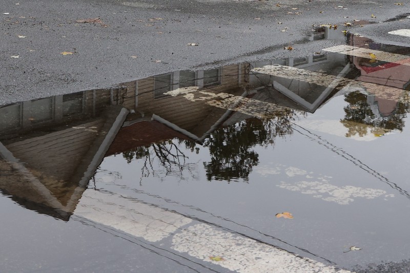 Flooded cars are pictured on a street as heavy rain moved into the northeast U.S. in Hoboken, New Jersey, U.S. October 26, 2021. REUTERS/Mike Segar