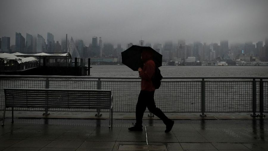 Flooded cars are pictured on a street as heavy rain moved into the northeast U.S. in Hoboken, New Jersey, U.S. October 26, 2021. REUTERS/Mike Segar