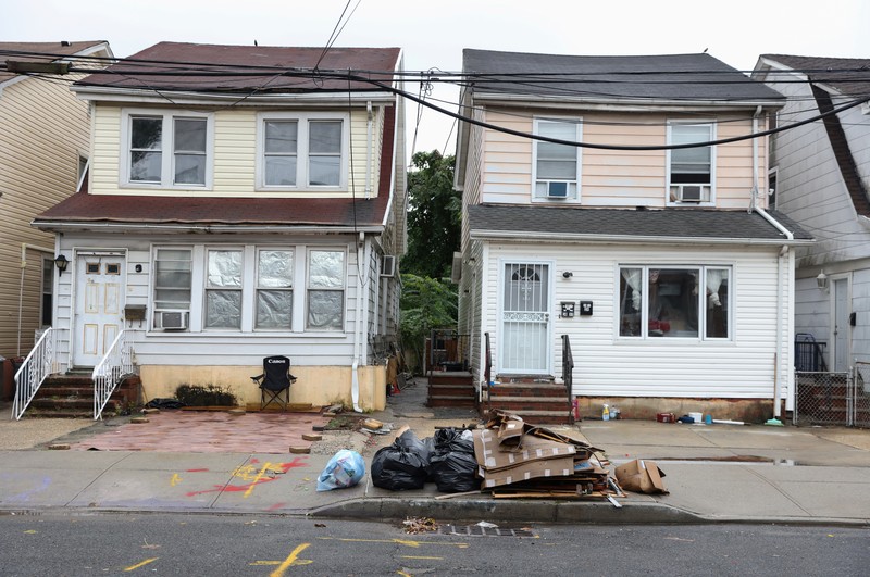 Flooded cars are pictured on a street as heavy rain moved into the northeast U.S. in Hoboken, New Jersey, U.S. October 26, 2021. REUTERS/Mike Segar