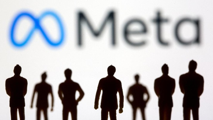 Meta Small toy figures are seen in front of displayed Facebook's new rebrand logo Meta in this illustration taken, October 28, 2021. REUTERS/Dado Ruvic/Illustration