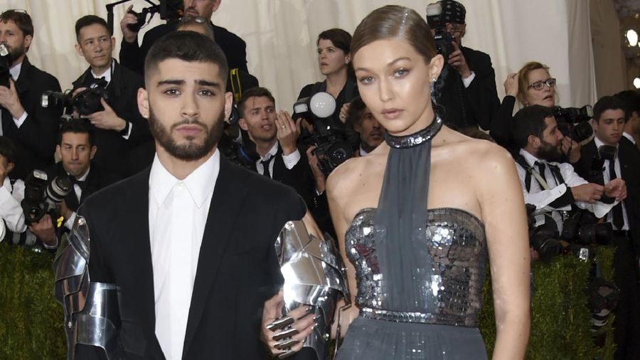 FILE - In this May 2, 2016 file photo, Zayn Malik, left, and Gigi Hadid arrive at The Metropolitan Museum of Art Costume Institute Benefit Gala in New York. Hadid and Malik are confirming on social media that their romance is over. The 22-year-old model and 25-year-old musician each posted on Twitter Tuesday about the end of their two-year relationship. (Photo by Evan Agostini/Invision/AP, File)