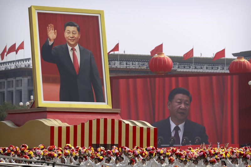 Chinese military vehicles carrying DF-17 ballistic missiles roll during a parade to commemorate the 70th anniversary of the founding of Communist China in Beijing, Tuesday, Oct. 1, 2019. Trucks carrying weapons including a nuclear-armed missile designed to evade U.S. defenses rumbled through Beijing as the Communist Party celebrated its 70th anniversary in power with a parade Tuesday that showcased China's ambition as a rising global force. (AP Photo/Mark Schiefelbein)