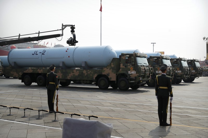 China 70 Years Chinese military vehicles carrying DF-17 ballistic missiles roll during a parade to commemorate the 70th anniversary of the founding of Communist China in Beijing, Tuesday, Oct. 1, 2019. Trucks carrying weapons including a nuclear-armed missile designed to evade U.S. defenses rumbled through Beijing as the Communist Party celebrated its 70th anniversary in power with a parade Tuesday that showcased China's ambition as a rising global force. (AP Photo/Mark Schiefelbein)