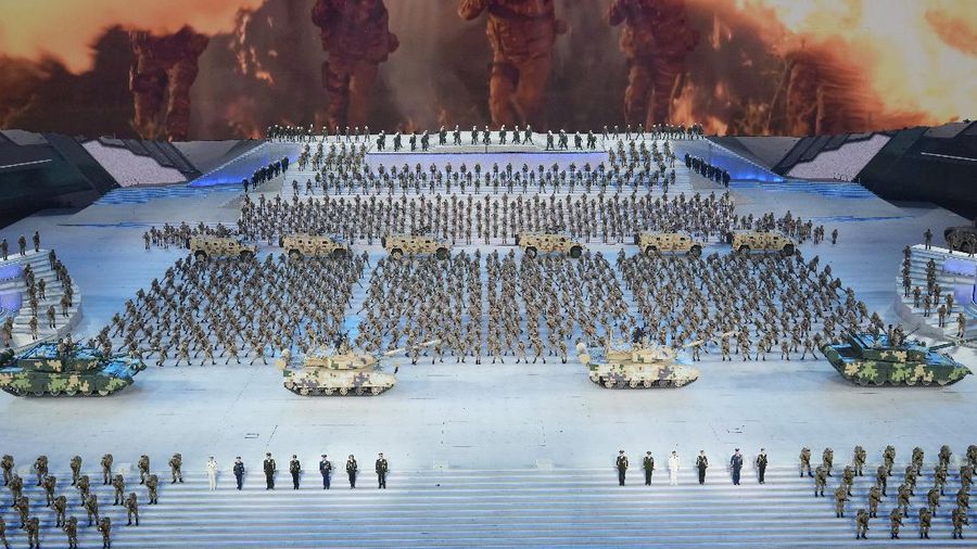 Chinese military vehicles carrying DF-17 ballistic missiles roll during a parade to commemorate the 70th anniversary of the founding of Communist China in Beijing, Tuesday, Oct. 1, 2019. Trucks carrying weapons including a nuclear-armed missile designed to evade U.S. defenses rumbled through Beijing as the Communist Party celebrated its 70th anniversary in power with a parade Tuesday that showcased China's ambition as a rising global force. (AP Photo/Mark Schiefelbein)