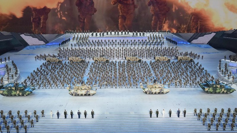 Chinese military vehicles carrying DF-17 ballistic missiles roll during a parade to commemorate the 70th anniversary of the founding of Communist China in Beijing, Tuesday, Oct. 1, 2019. Trucks carrying weapons including a nuclear-armed missile designed to evade U.S. defenses rumbled through Beijing as the Communist Party celebrated its 70th anniversary in power with a parade Tuesday that showcased China's ambition as a rising global force. (AP Photo/Mark Schiefelbein)