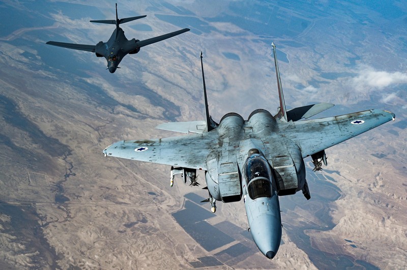 In this photo released by the U.S. Air Force, F-16s flown by the Egyptian Air Force break away from a U.S. Air Force B-1B Lancer over Egypt Saturday, Oct. 30, 2021. The U.S. Air Force said Sunday it flew a B-1B strategic bomber over key maritime chokepoints in the Mideast with allies including Israel amid ongoing tensions with Iran as its nuclear deal with world powers remains in tatters. (U.S. Air Force/Senior Airman Jerreht Harris via AP)