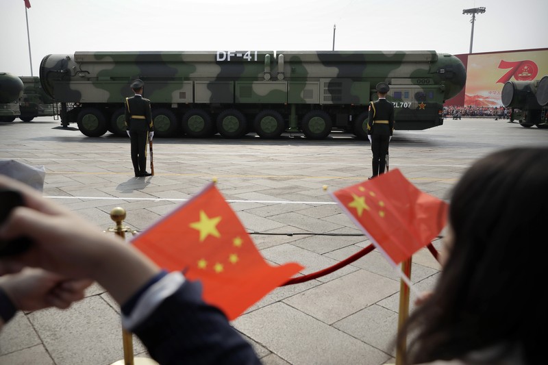 China 70 Years Chinese United Nations (UN) peacekeeping forces march in formation during a parade to commemorate the 70th anniversary of the founding of Communist China in Beijing, Tuesday, Oct. 1, 2019. Trucks carrying weapons including a nuclear-armed missile designed to evade U.S. defenses rumbled through Beijing as the Communist Party celebrated its 70th anniversary in power with a parade Tuesday that showcased China's ambition as a rising global force. (AP Photo/Mark Schiefelbein)