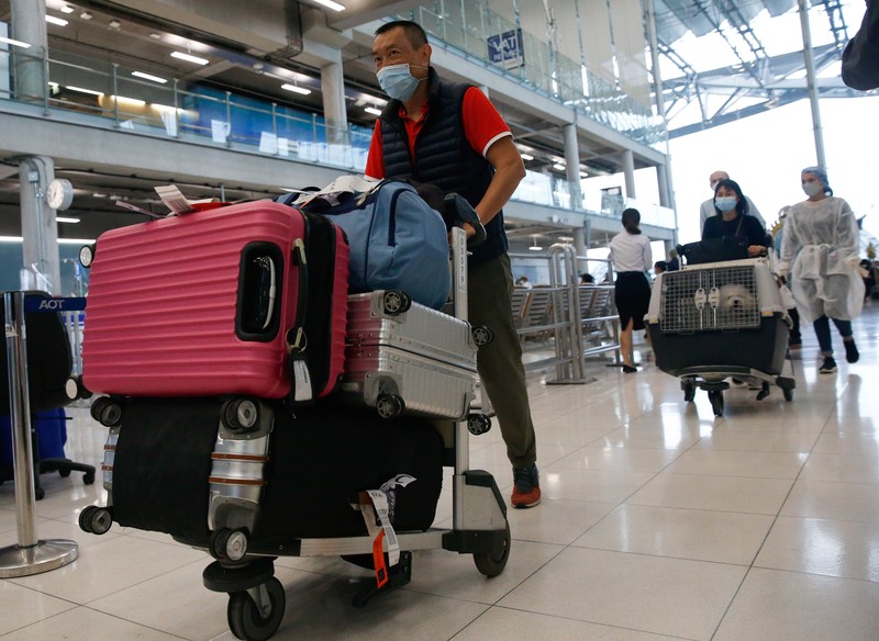 First group of foreign tourists arrive at Suvarnabhumi Airport during the first day of the country's reopening campaign, part of the government's plan to jump start the pandemic-hit tourism sector in Bangkok, Thailand November 1, 2021. REUTERS/Soe Zeya Tun     TPX IMAGES OF THE DAY