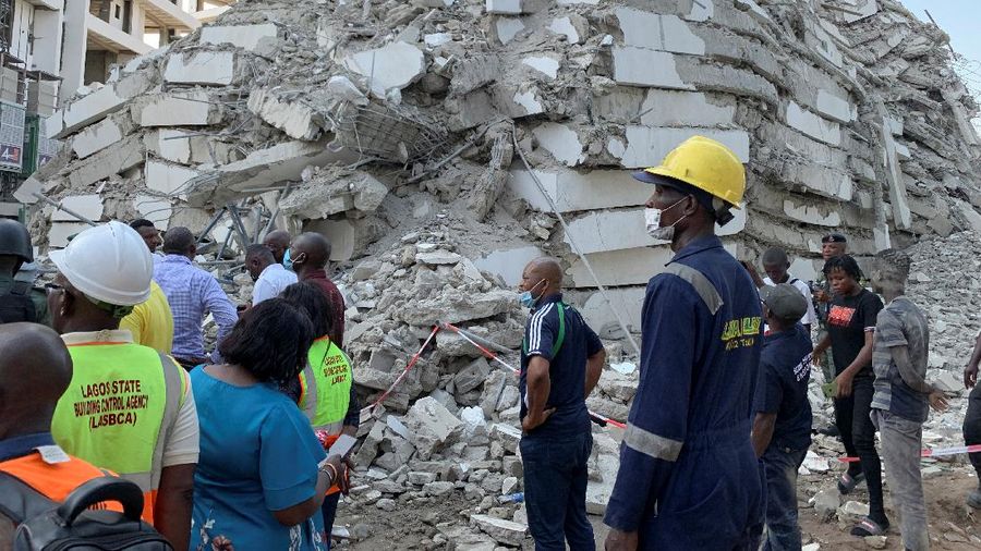 Emergency personnel stands by the debris of the collapsed building in Ikoyi, Lagos, Nigeria, November 1, 2021. Picture taken November 1, 2021. REUTERS/Nneka Chile