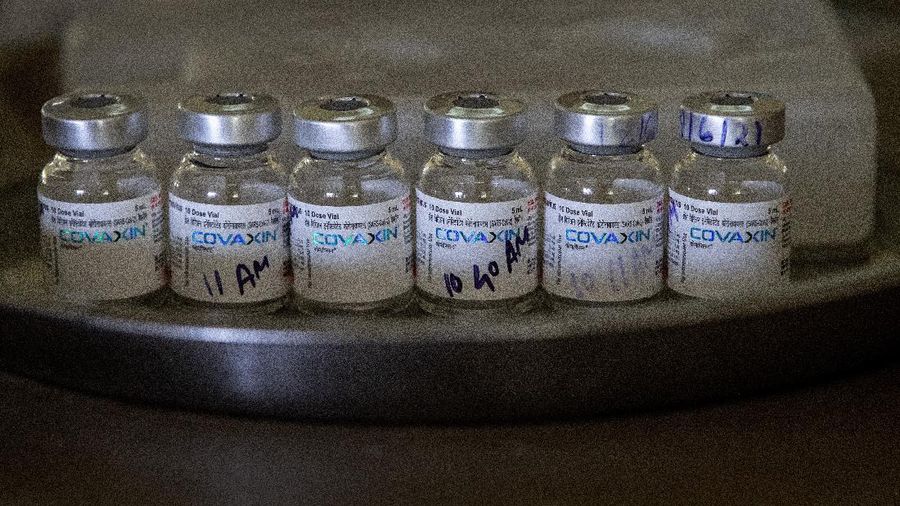 Empty vials of Covaxin COVID-19 vaccine lie on a table at the venue of a vaccination drive in Gauhati, India, Friday, June 18, 2021. (AP Photo/Anupam Nath)