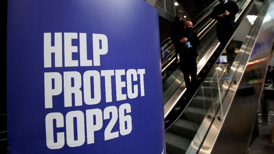 A banner advertising the UN Climate Change Conference (COP 26) where world leaders discuss how to tackle climate change on a global scale, is seen inside the conference area in Glasgow Scotland, Britain October 31, 2021.  REUTERS/Yves Herman