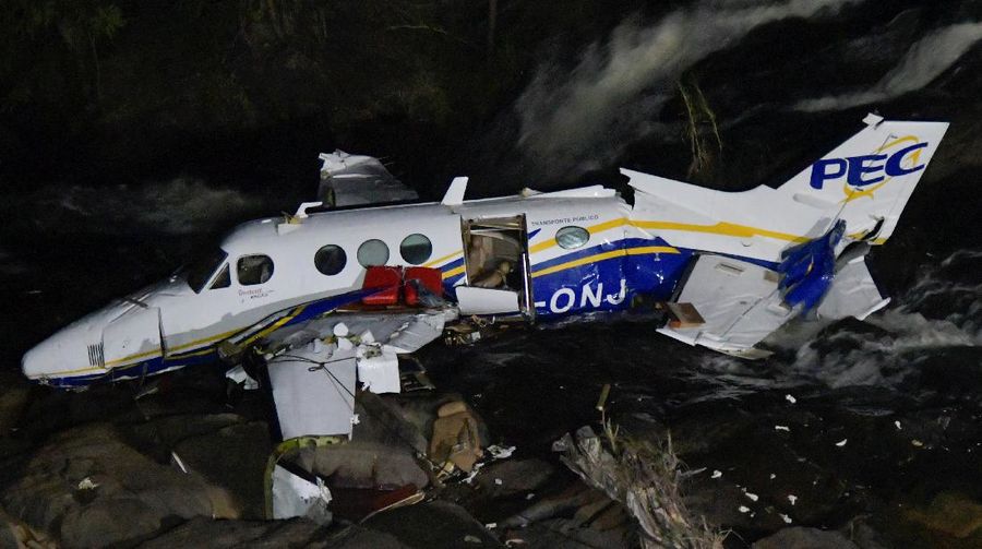 The wreckage of a small airplane that crashed with Brazilian country singer Marilia Mendonca on board, is seen near a waterfall area in Piedade de Caratinga, state of Minas Gerais, Brazil, November 6, 2021. REUTERS/Washington Alves