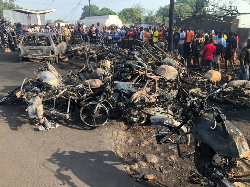 Burnt collided trucks are pictured after a fuel tanker explosion in Freetown, Sierra Leone November 6, 2021. National Disaster Management Agency-Sierra Leone/Handout via REUTERS    THIS IMAGE HAS BEEN SUPPLIED BY A THIRD PARTY. NO RESALES. NO ARCHIVES.