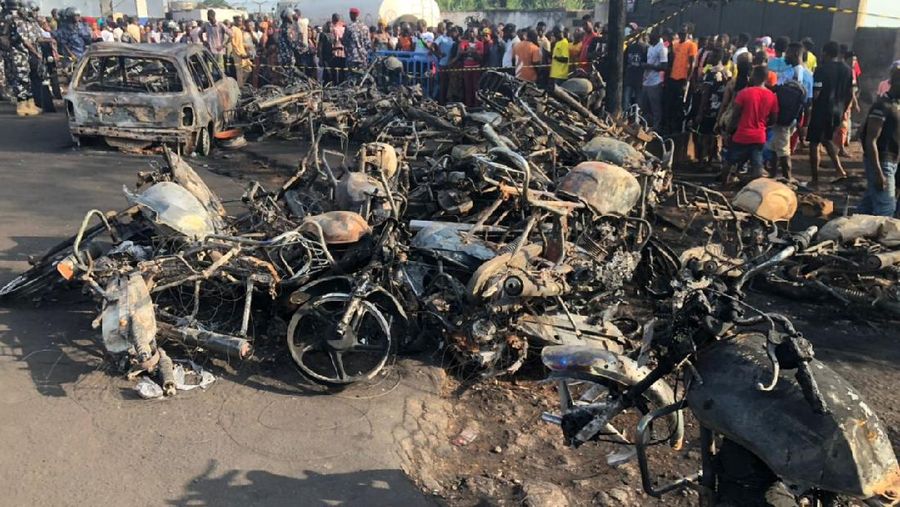 Burnt collided trucks are pictured after a fuel tanker explosion in Freetown, Sierra Leone November 6, 2021. National Disaster Management Agency-Sierra Leone/Handout via REUTERS    THIS IMAGE HAS BEEN SUPPLIED BY A THIRD PARTY. NO RESALES. NO ARCHIVES.