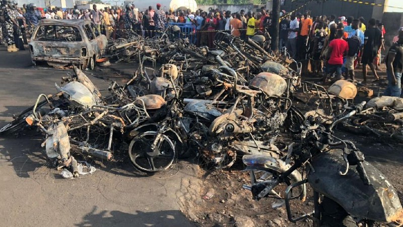 Burnt collided trucks are pictured after a fuel tanker explosion in Freetown, Sierra Leone November 6, 2021. National Disaster Management Agency-Sierra Leone/Handout via REUTERS    THIS IMAGE HAS BEEN SUPPLIED BY A THIRD PARTY. NO RESALES. NO ARCHIVES.
