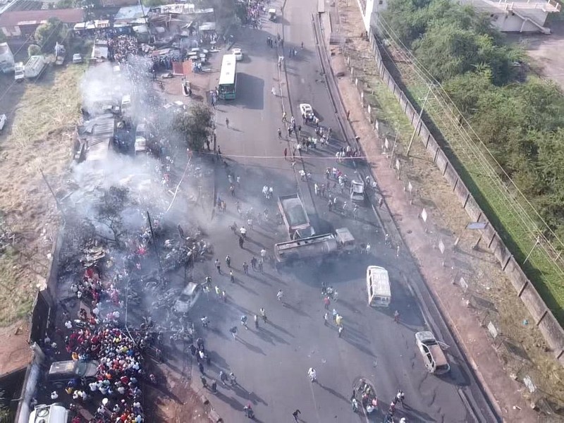 Burnt collided trucks are pictured after a fuel tanker explosion in Freetown, Sierra Leone November 6, 2021. National Disaster Management Agency-Sierra Leone/Handout via REUTERS    THIS IMAGE HAS BEEN SUPPLIED BY A THIRD PARTY. NO RESALES. NO ARCHIVES.