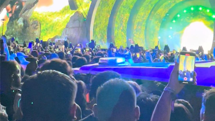 Ambulance is seen in the crowd during rap star Travis Scott's Astroworld festival in Houston, Texas, U.S., in this still image from social media video November 5, 2021.   TWITTER @anthony_t8/via REUTERS  ATTENTION EDITORS - THIS IMAGE HAS BEEN SUPPLIED BY A THIRD PARTY. MANDATORY CREDIT