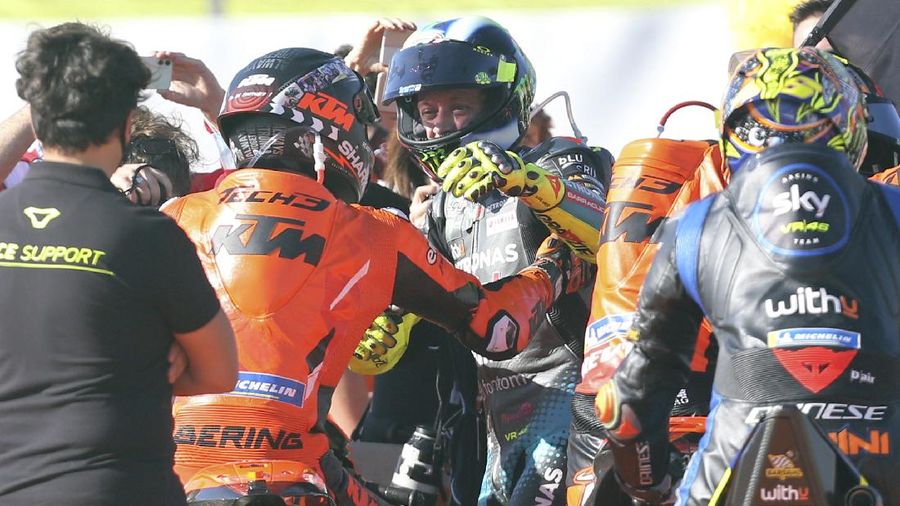 MotoGP rider Valentino Rossi of Italy sits in the team box during warmup before the Valencia Motorcycle Grand Prix, the last race of the season, at the Ricardo Tormo circuit in Cheste, near Valencia, Spain, Sunday, Nov. 14, 2021. Rossi will be retiring from MotoGP racing as the season ends in Valencia. (AP Photo/Alberto Saiz)