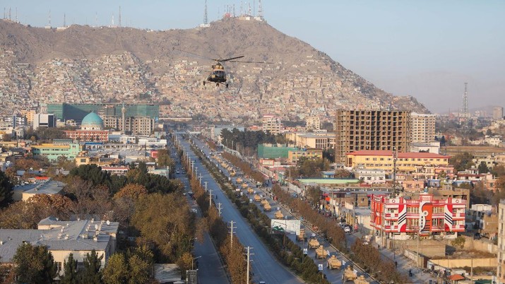 AFGHANISTAN-CONFLICT/MILITARY A military helicopter is pictured during the Taliban military parade in Kabul, Afghanistan November 14, 2021. REUTERS/Ali Khara NO RESALES. NO ARCHIVES