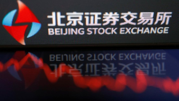 The logo of China's Beijing Stock Exchange is seen by a stock chart in this illustration picture taken November 12, 2021. REUTERS/Florence Lo/Illustration
