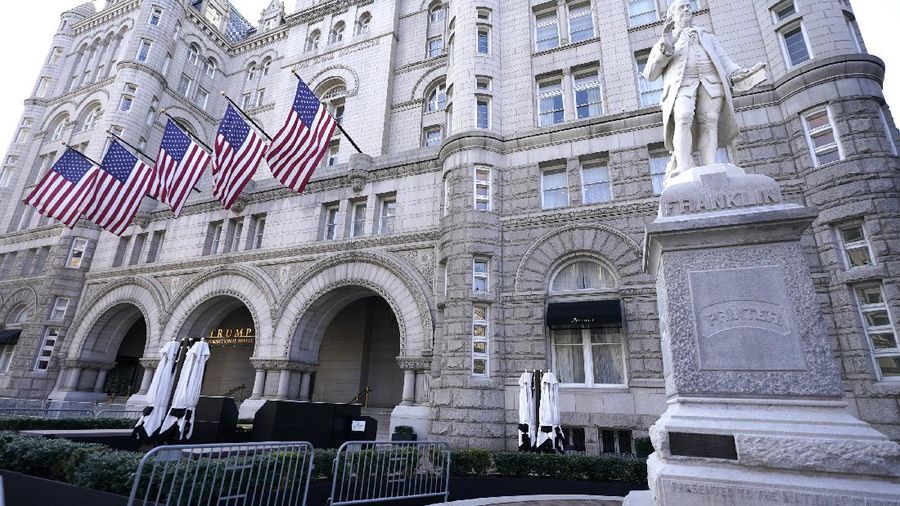 FILE- The Trump International Hotel on Pennsylvania Avenue is seen on March 4, 2021, in Washington. Former President Donald Trump's company lost more than $70 million operating his Washington D.C. hotel while in office, forcing him at one point get a reprieve from a major bank on payments on a loan, according to documents released Friday, Oct. 8, by a House committee investigating his business. (AP Photo/Julio Cortez, File)