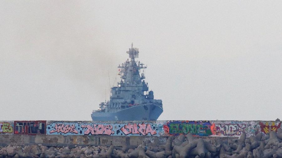 The Russian Navy's guided missile cruiser Moskva (Moscow) sails past the Monument to Scuttled Ships into a harbour after tracking NATO warships in the Black Sea, in the port of Sevastopol, Crimea November 16, 2021. REUTERS/Alexey Pavlishak