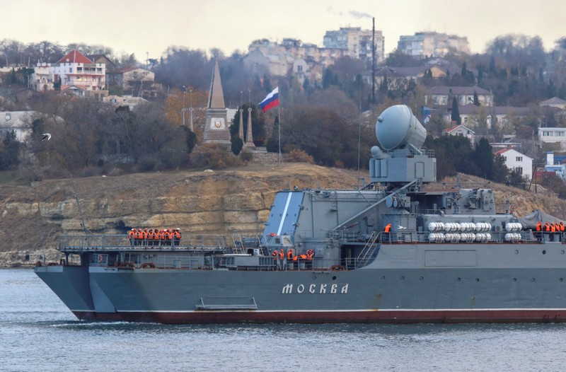 The Russian Navy's guided missile cruiser Moskva (Moscow) sails past the Monument to Scuttled Ships into a harbour after tracking NATO warships in the Black Sea, in the port of Sevastopol, Crimea November 16, 2021. REUTERS/Alexey Pavlishak