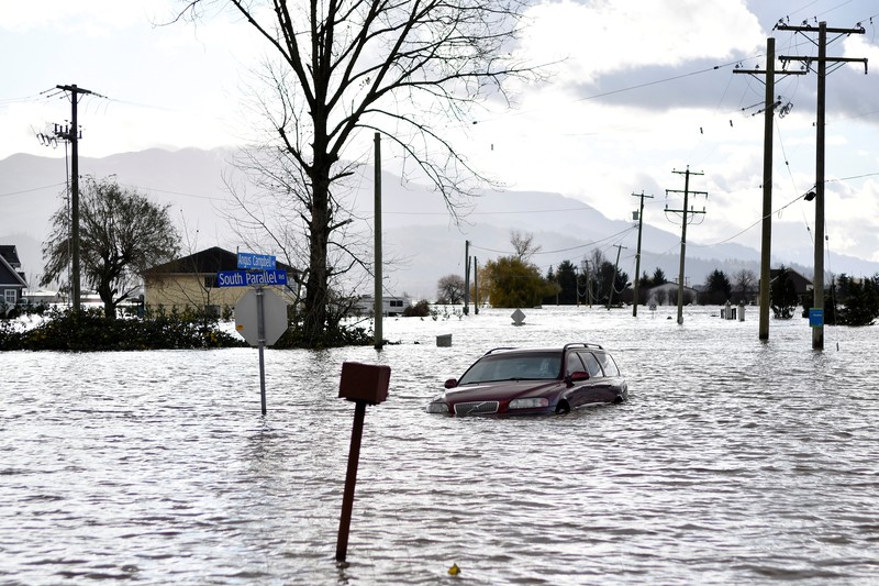 South Parallel road is submerged in flood water after rainstorms caused flooding and landslides in Abbotsford, British Columbia, Canada November 16, 2021.  REUTERS/Jennifer Gauthier