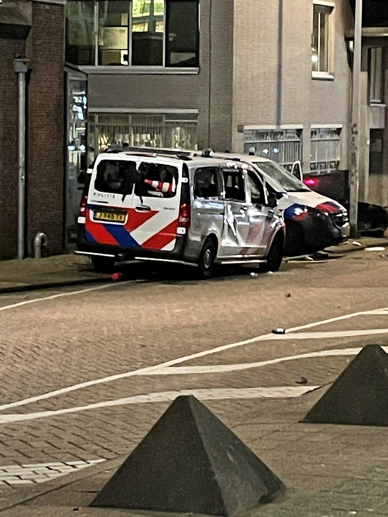 In this image taken from video, demonstrators protest against government restrictions due to the coronavirus pandemic, Friday, Nov. 19, 2021, in Rotterdam, Netherlands. Police fired warning shots, injuring an unknown number of people, as riots broke out Friday night in downtown Rotterdam at a demonstration against plans by the government to restrict access for unvaccinated people to some venues. (Media TV Rotterdam via AP)