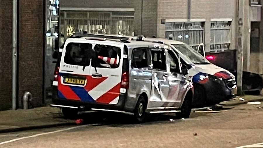 In this image taken from video, demonstrators protest against government restrictions due to the coronavirus pandemic, Friday, Nov. 19, 2021, in Rotterdam, Netherlands. Police fired warning shots, injuring an unknown number of people, as riots broke out Friday night in downtown Rotterdam at a demonstration against plans by the government to restrict access for unvaccinated people to some venues. (Media TV Rotterdam via AP)