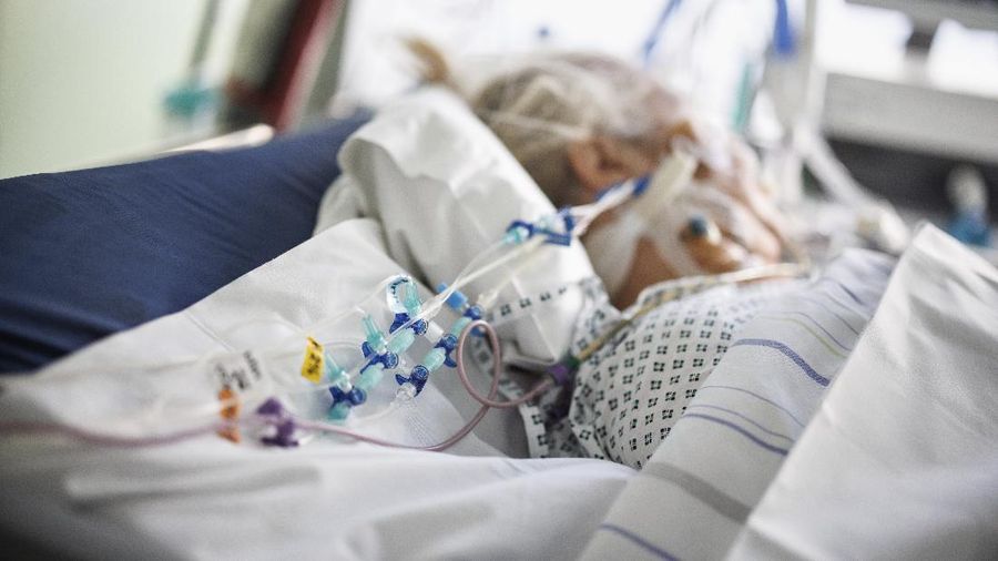 A COVID-19 patient is being treated in the ICU of the Asklepios Clinic, in Gauting, Germany, Friday, Nov. 19, 2021. The head of Germany’s disease control agency said Friday that the country has entered into a “nationwide state of emergency” because of surging coronavirus infections. The head of the Robert Koch Institute said regular medical care cannot be guaranteed anymore in some parts of the country because hospitals and intensive care wards are overstretched. (Matthias Balk/dpa via AP)